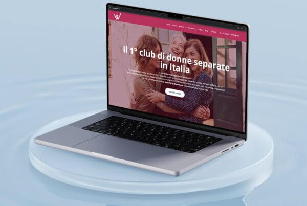 Pc con la homepage di Wommate